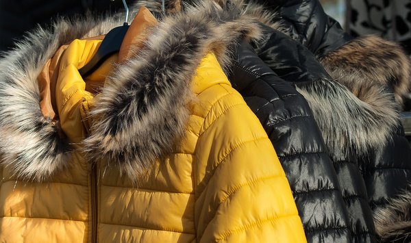 What are the best tips for wearing a puffer jacket stylishly?